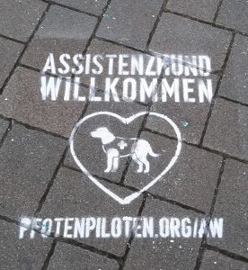 "Assistenzhund Willkommen"-Sprühmarkierung