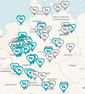 Screenshot einer Deutschlandkarte mit ca. 80 Markern für assistenzhundfreundliche Kommunen